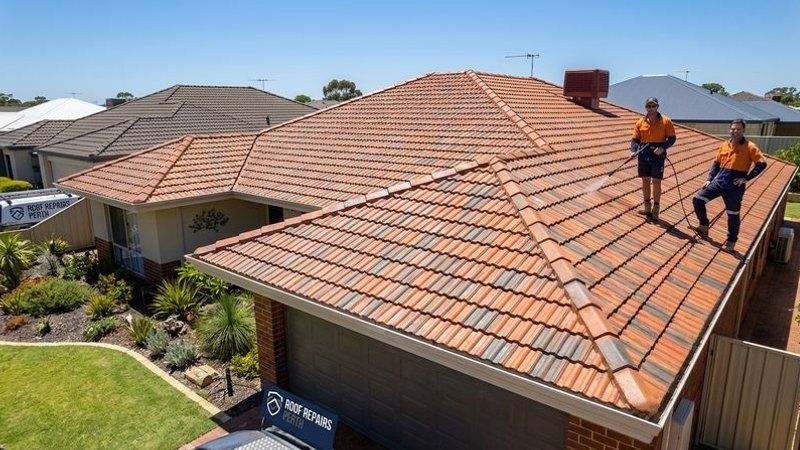 Freshly cleaned bright roof tiles on a Perth home gleaming in the sunlight after professional cleaning