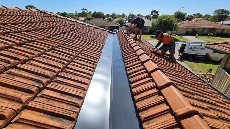 New Colorbond valley iron installed on a Perth tiled roof showing clean water channel and proper tile overlap
